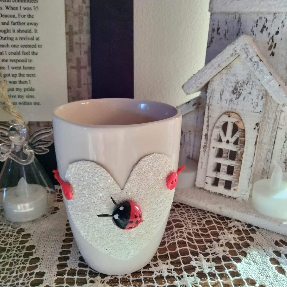 Ceramic mug with handmade knitted hot or iced cup sleeve